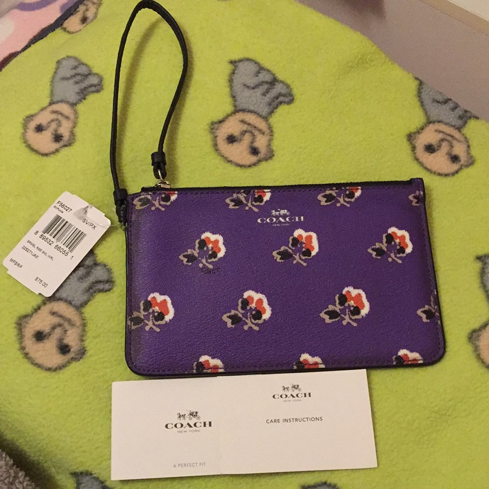 Coach handcrafted accessory, mini handbag